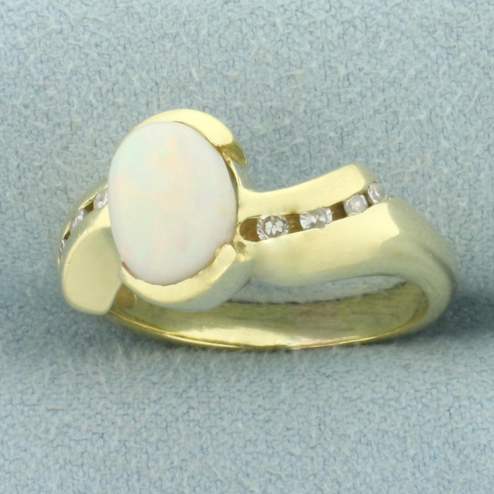 Opal And Diamond Ring In 18k Yellow Gold