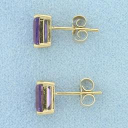 Emerald Cut Amethyst Stud Earrings In 14k Yellow Gold