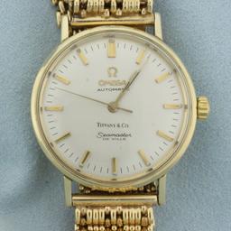 Omega Tiffany And Co. Seamaster Deville Wristwatch In Solid 14k Yellow Gold