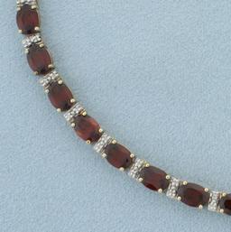 Oval Cut Garnet And Diamond Tennis Bracelet In 14k Yellow Gold