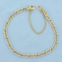 Figaro Link Bracelet In 14k Yellow Gold