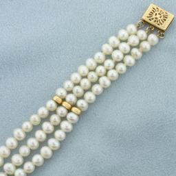 Triple Strand Cultured Pearl Bracelet In 14k Yellow Gold