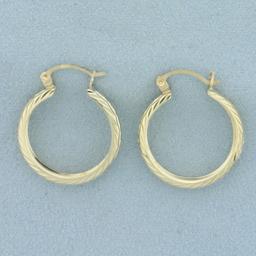 Diamond Cut Hoop Earrings In 14k Yellow Gold