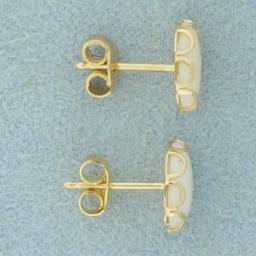 Oval Opal Stud Earrings In 14k Yellow Gold