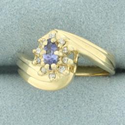 Tanzanite And Diamond Flower Bypass Ring In 14k Yellow Gold