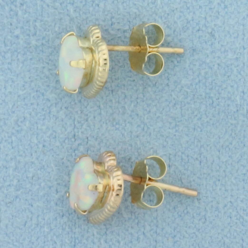 Heart Opal Stud Earrings In 14k Yellow Gold