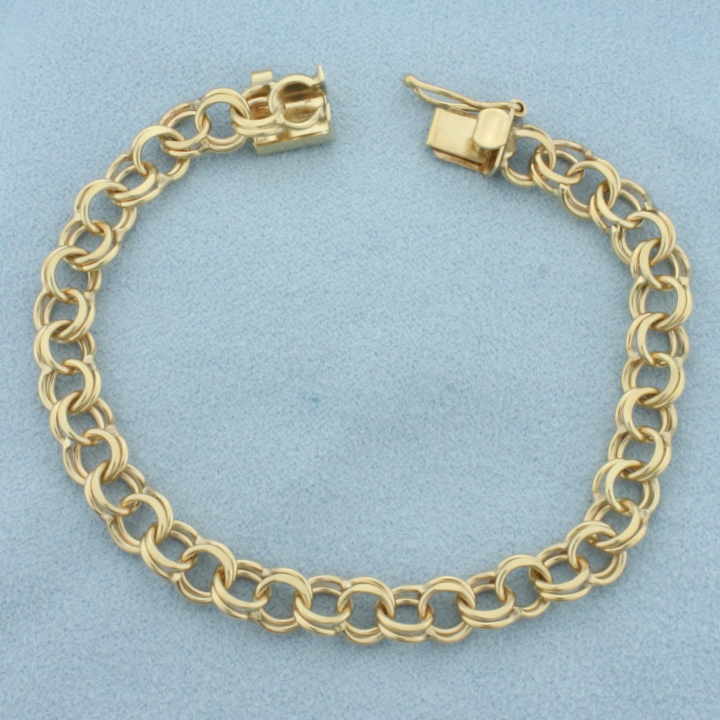 Double Ring Charm Bracelet In 14k Yellow Gold