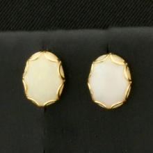 Oval Opal Stud Earrings In 14k Yellow Gold