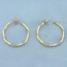 Twisting Hoop Earrings In 14k Yellow Gold