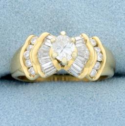 Oval Baguette And Round Diamond Engagement Ring In 14k Yellow Gold
