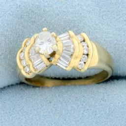 Oval Baguette And Round Diamond Engagement Ring In 14k Yellow Gold