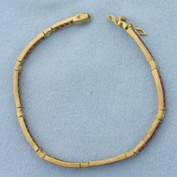 Ruby And Diamond Line Tennis Bracelet In 18k Yellow Gold