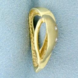 Unique Diamond Heart Pendant In 14k Yellow Gold