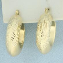 Diamond Cut Hoop Earrings In 14k Yellow Gold