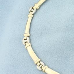 Two Tone Link Bracelet In 14k Yellow And White Gold