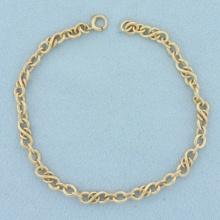 Love Knot Link Bracelet In 14k Yellow Gold