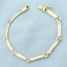 Two Tone Link Bracelet In 14k Yellow And White Gold