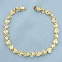 Diamond Cut Heart Link Bracelet In 14k Yellow Gold
