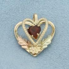 Unique Garnet Heart Pendant In 10k Yellow And Rose Gold