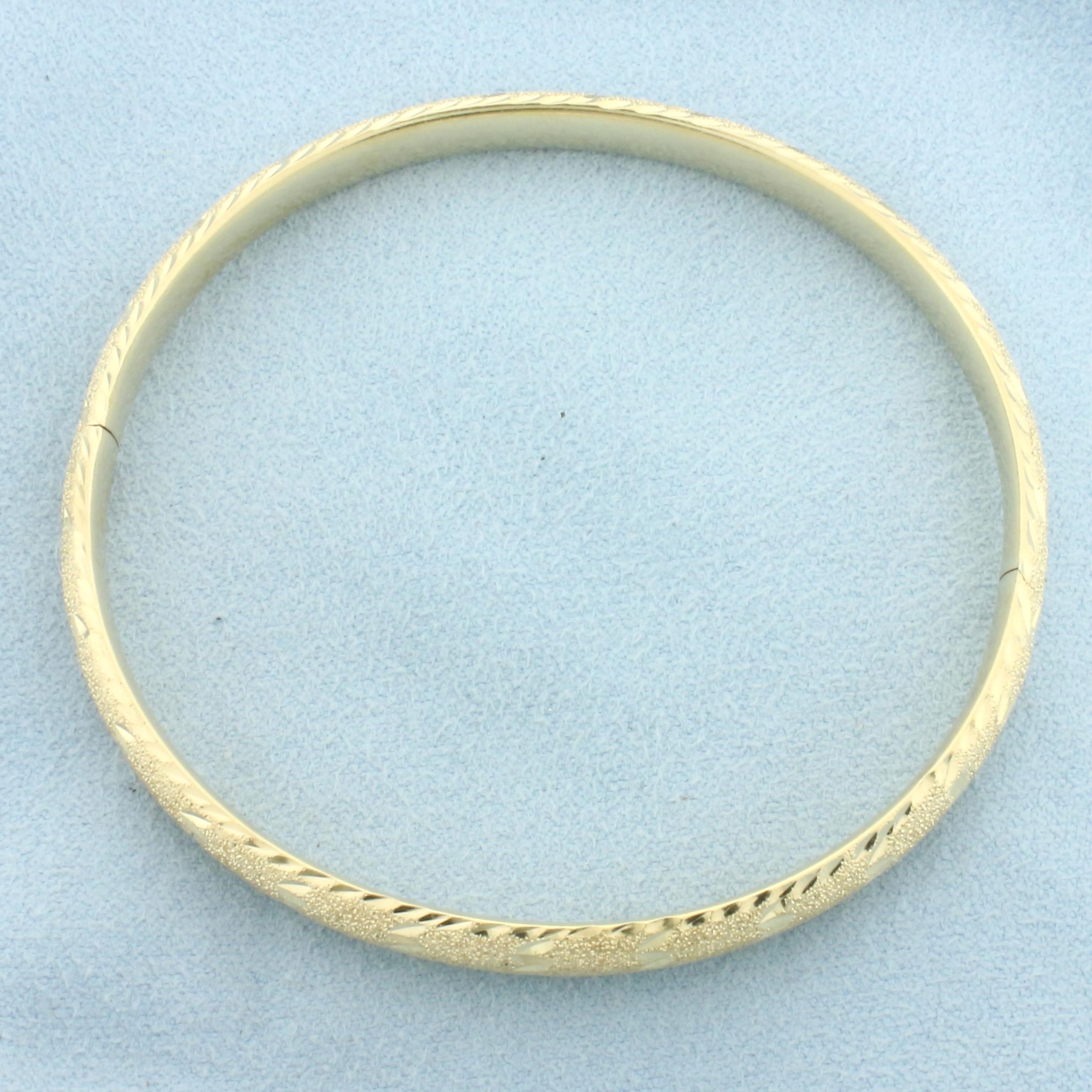 Sandblast And Diamond Cut Finish Hinged Bangle Bracelet In 14k Yellow Gold