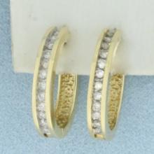 Diamond Oval Hoop Earrings In 14k Yellow Gold