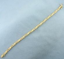Unique Scroll Deisgn Diamond Tennis Bracelet In 14k Yellow Gold