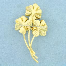 Designer Dankner Flower Pin With Emerald, Sapphire, Ruby, And Diamond In 18k Yellow Gold
