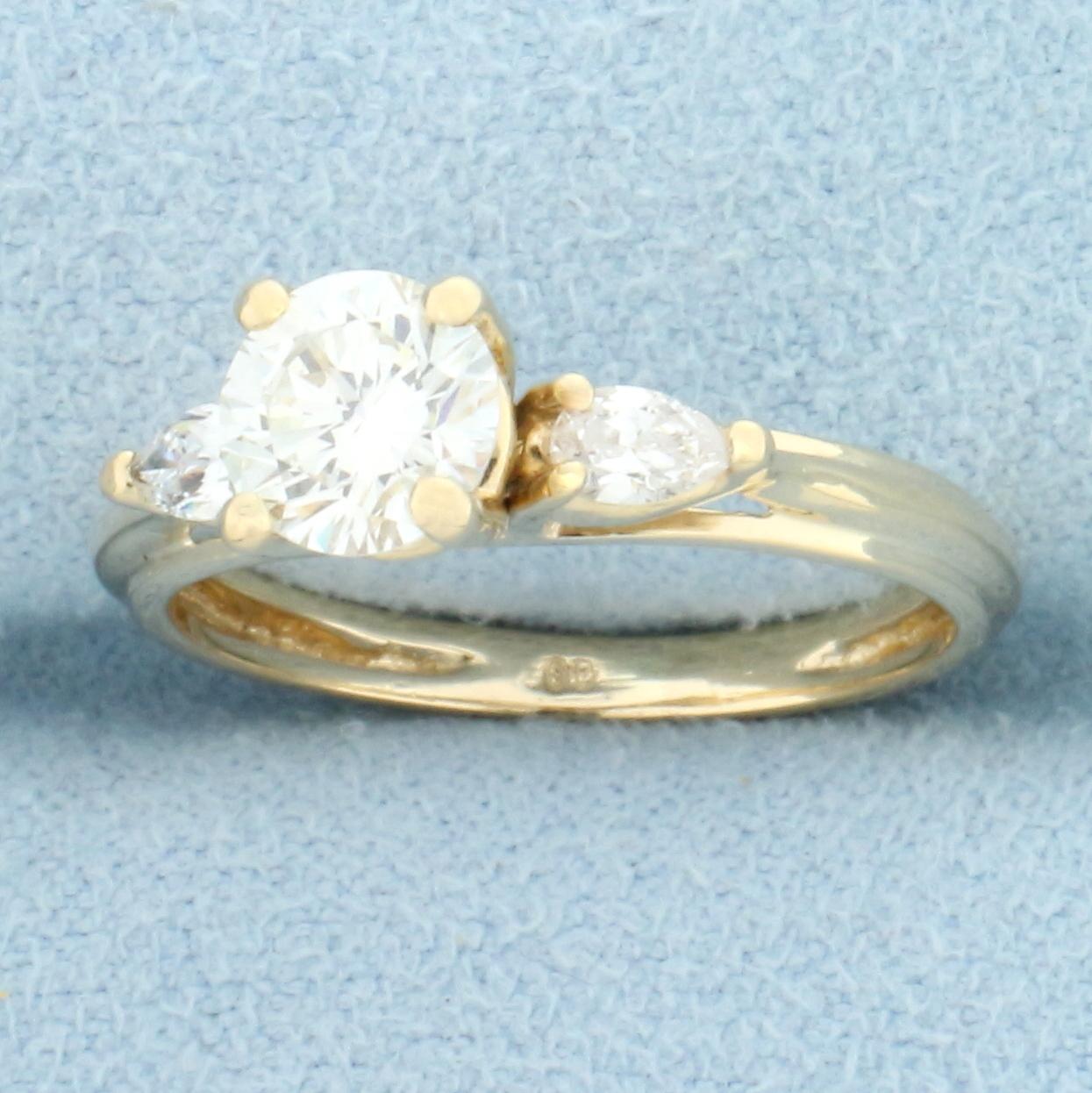 Round And Pear Diamond Engagement Ring In 14k Yellow Gold