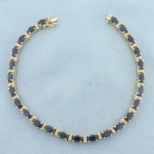 Sapphire And Diamond Tennis Bracelet In 14k Yellow Gold