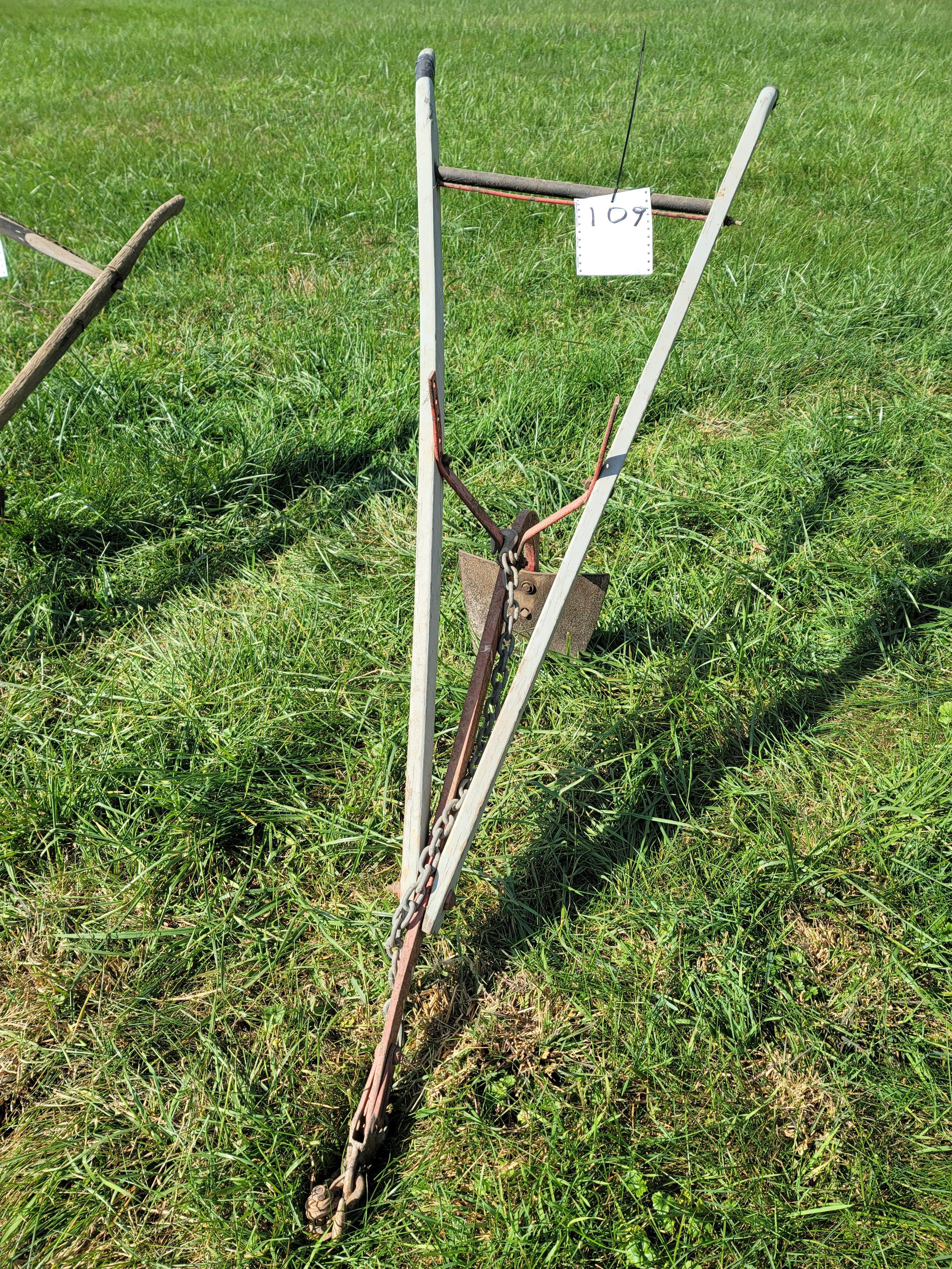Horse drawn row maker