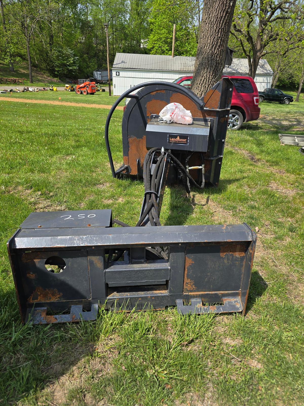 Boom mower for skid steer.