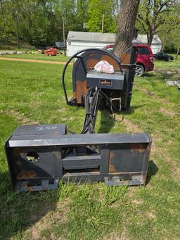Boom mower for skid steer.