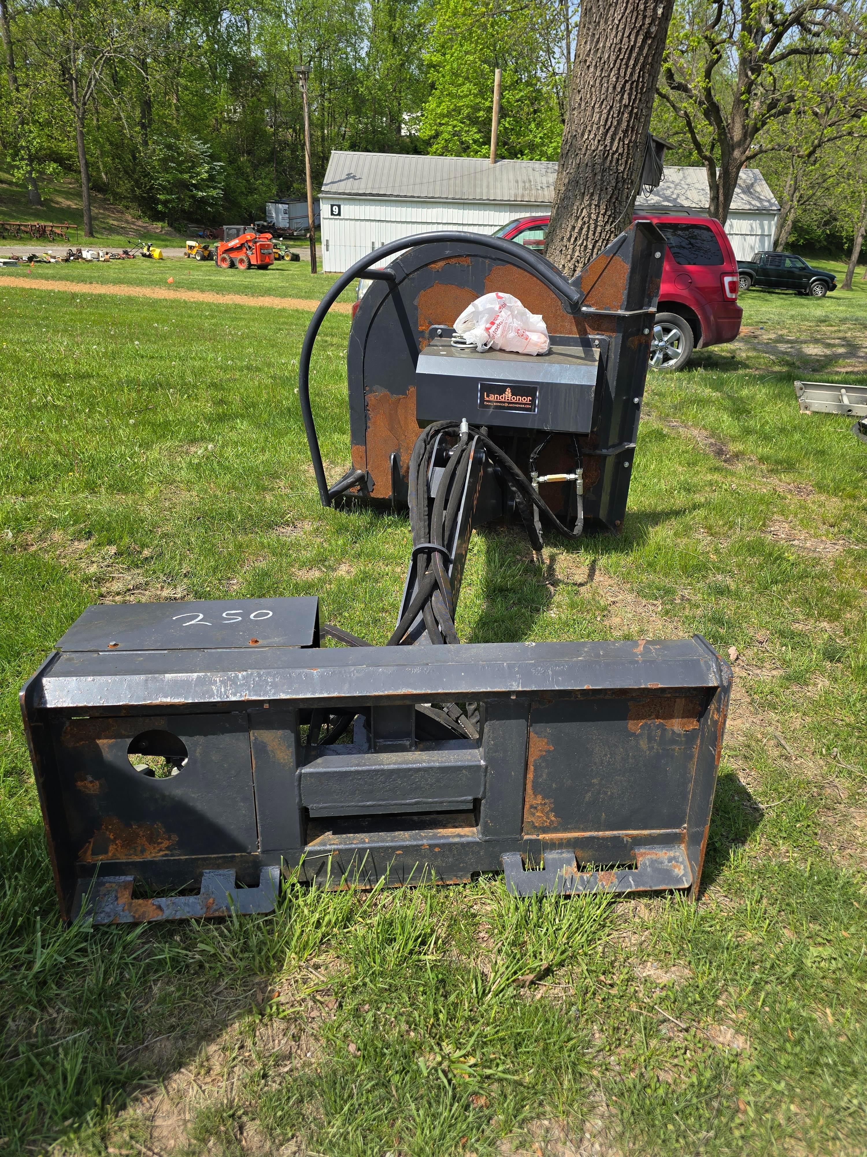 Boom mower for skid steer.