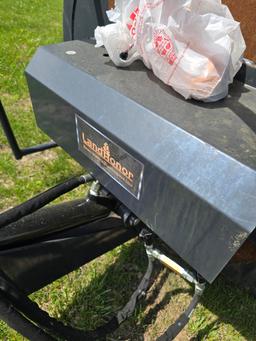 Boom mower for skid steer.