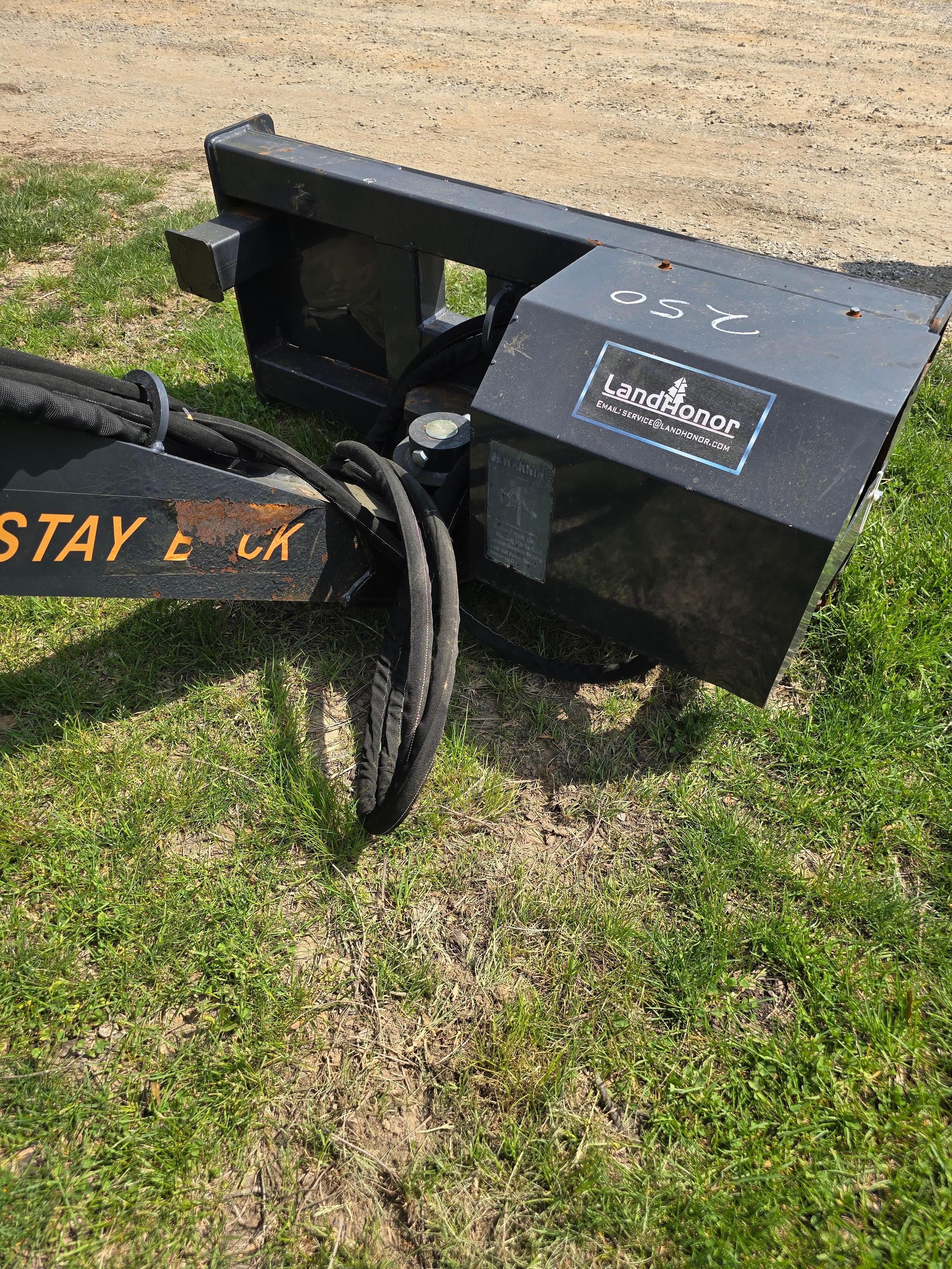 Boom mower for skid steer.