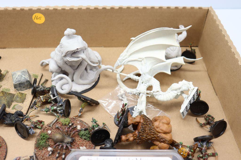 Assorted metal and plastic fantasy miniatures