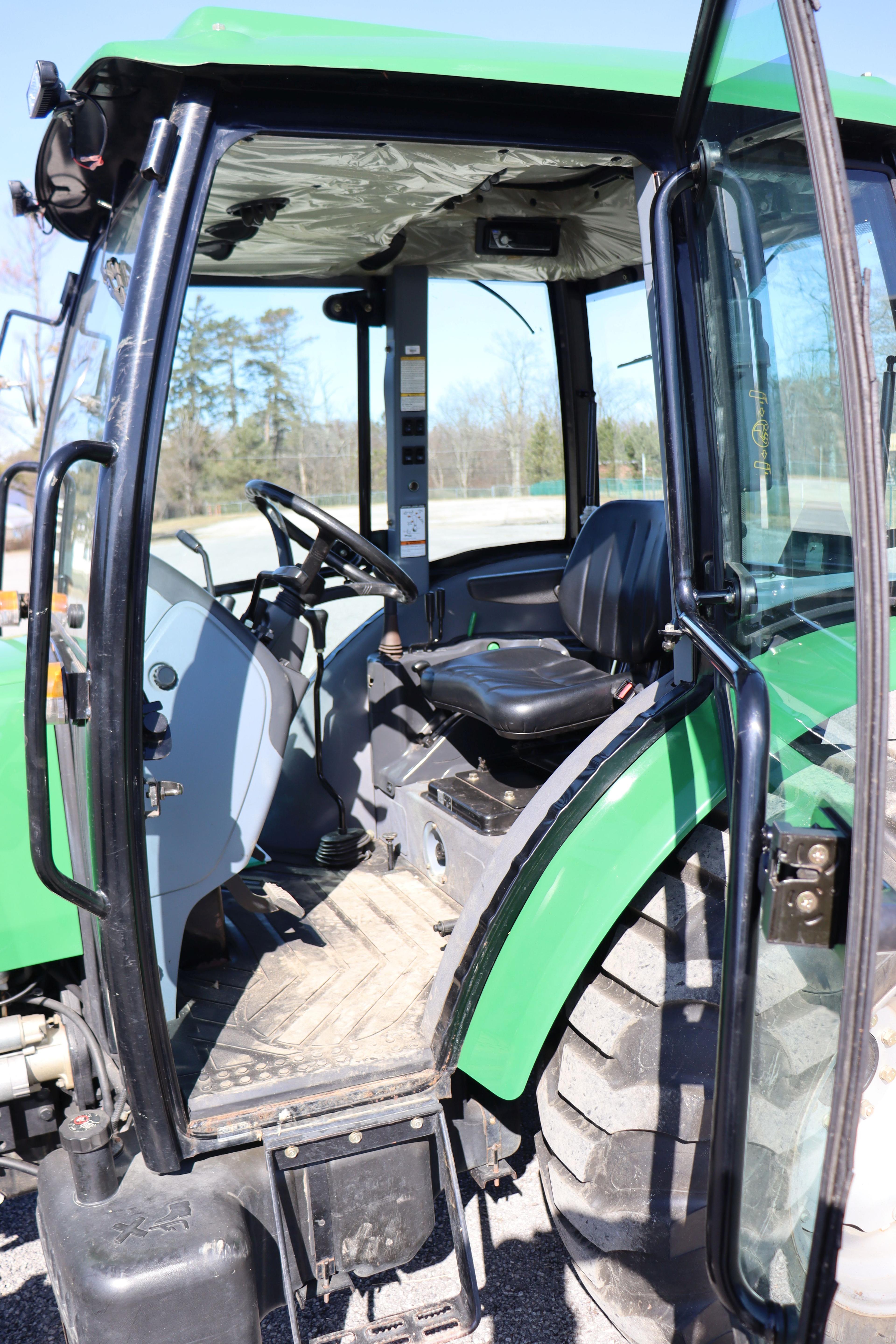 2009  Montana  U4984C compact  tractor, 791 hours, serial number U60CAAI000