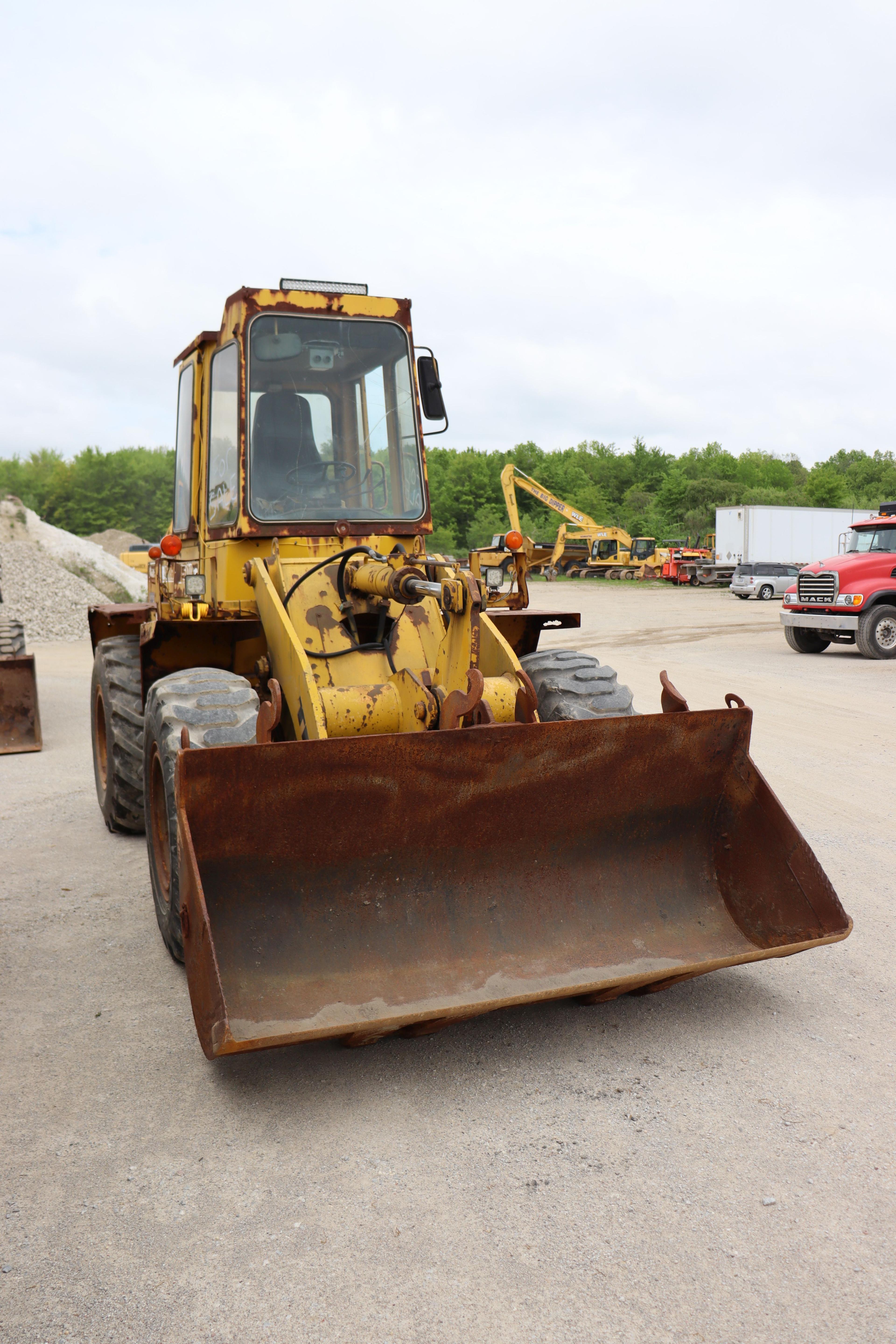 1995 Trojan 1500 Z wheel loader, reads 5,810 hours, serial number 312441