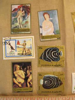 Lot of 12 postage stamps, all but one canceled, from Fujeira, one of the seven emirates that make up