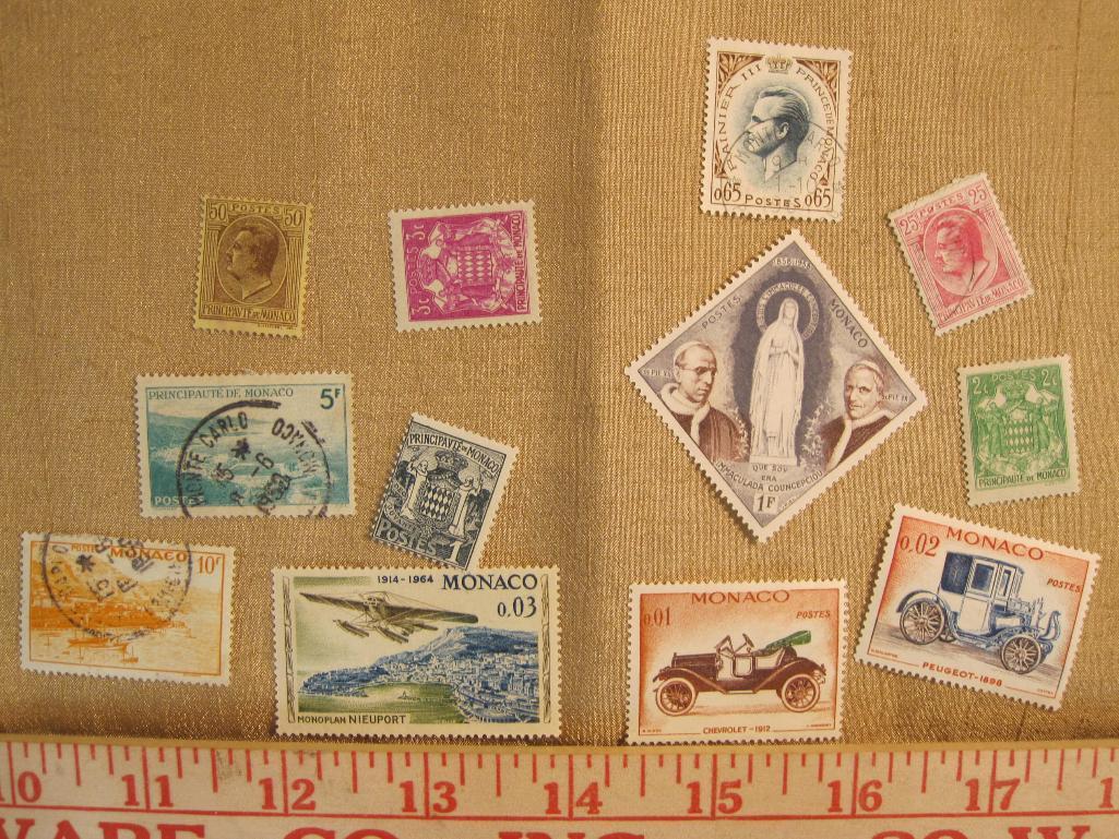 Lot of 12 Monoco postage stamps, most not canceled