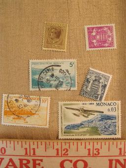 Lot of 12 Monoco postage stamps, most not canceled