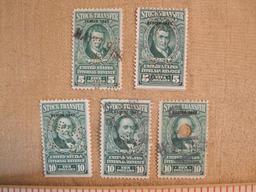 Two $5 and three $10 US Internal Revenue stock transfer stamps