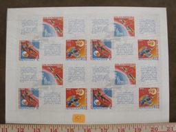 Full pane of twenty-four Russian space-themed stamps in original plastic wrapping