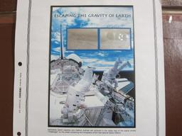 An official Scott album page, "Escaping the Gravity of Earth," with 2 2000 hologram $3.20 US postage