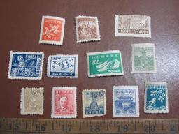 Lot of approximately one dozen 1940s Korean Postage Stamps, some used