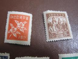 Lot of approximately one dozen 1940s Korean Postage Stamps, some used