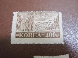 Lot of approximately one dozen 1940s Korean Postage Stamps, some used