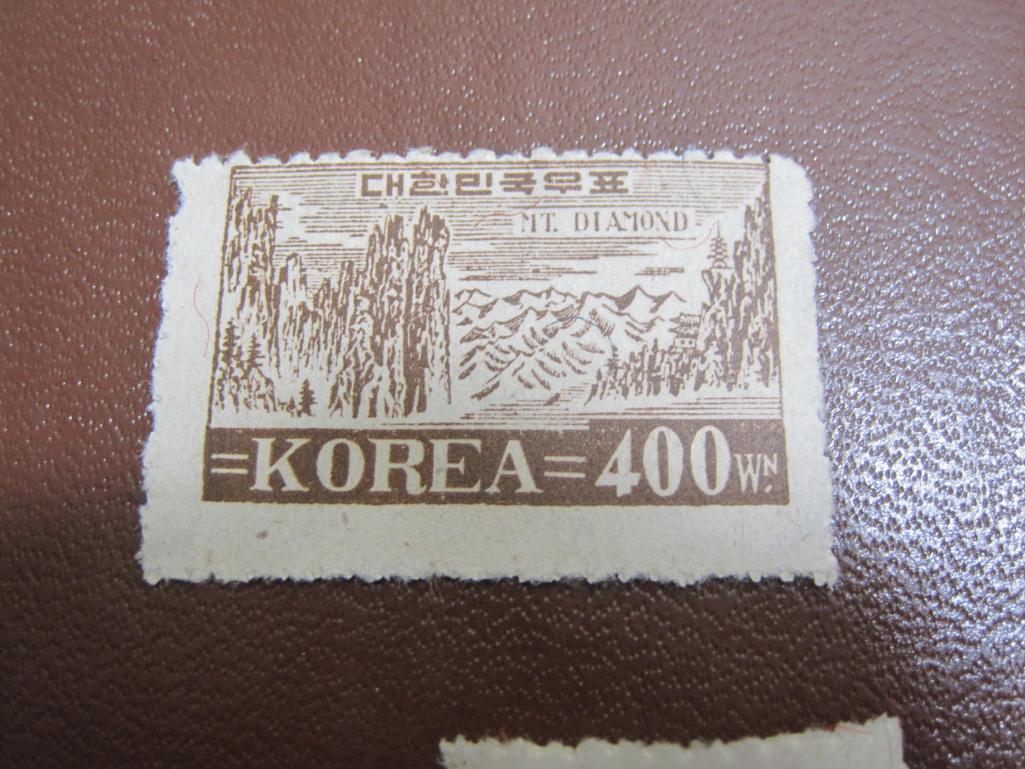 Lot of approximately one dozen 1940s Korean Postage Stamps, some used