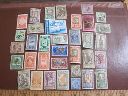 Mixed lot of more than TWO DOZEN foreign postage stamps from Ethiopia, British Honduras and Belgian