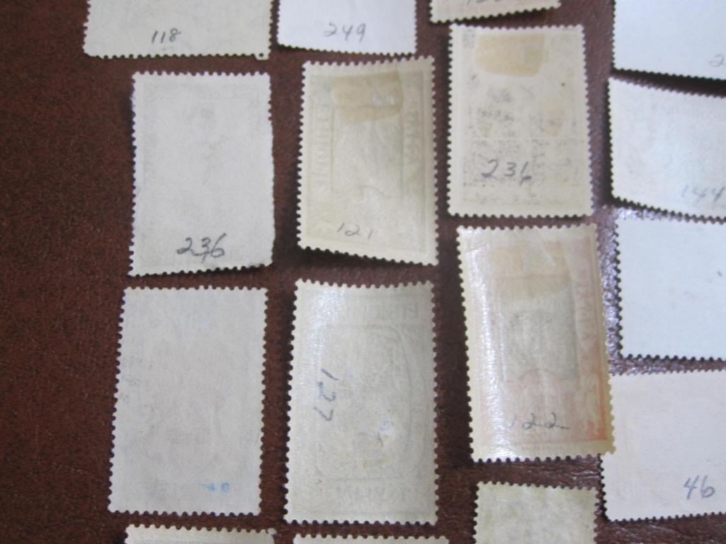 Mixed lot of more than TWO DOZEN foreign postage stamps from Ethiopia, British Honduras and Belgian